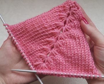 Raglanlinie im Schlingenmuster